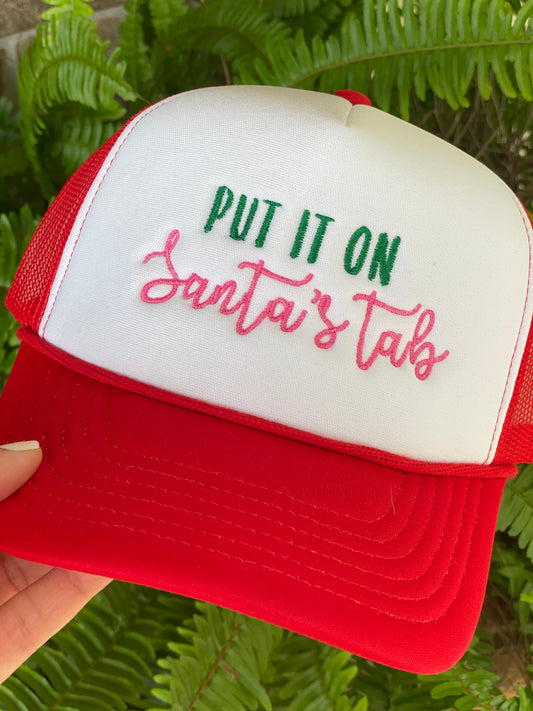 Put it on Santa’s tab red foam trucker cap
